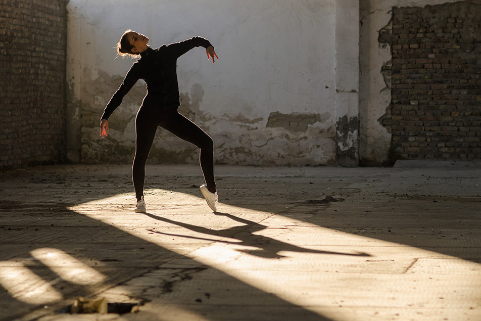 A lady in black clothes dancing. She is happy that there is no new email name required for private email.